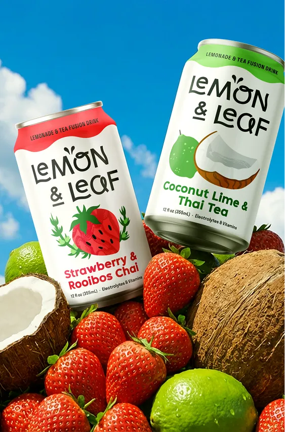 Lemon & Leaf Strawberry & Rooibos Chai and Coconut Lime & Thai Tea cans on fruit against a blue sky.