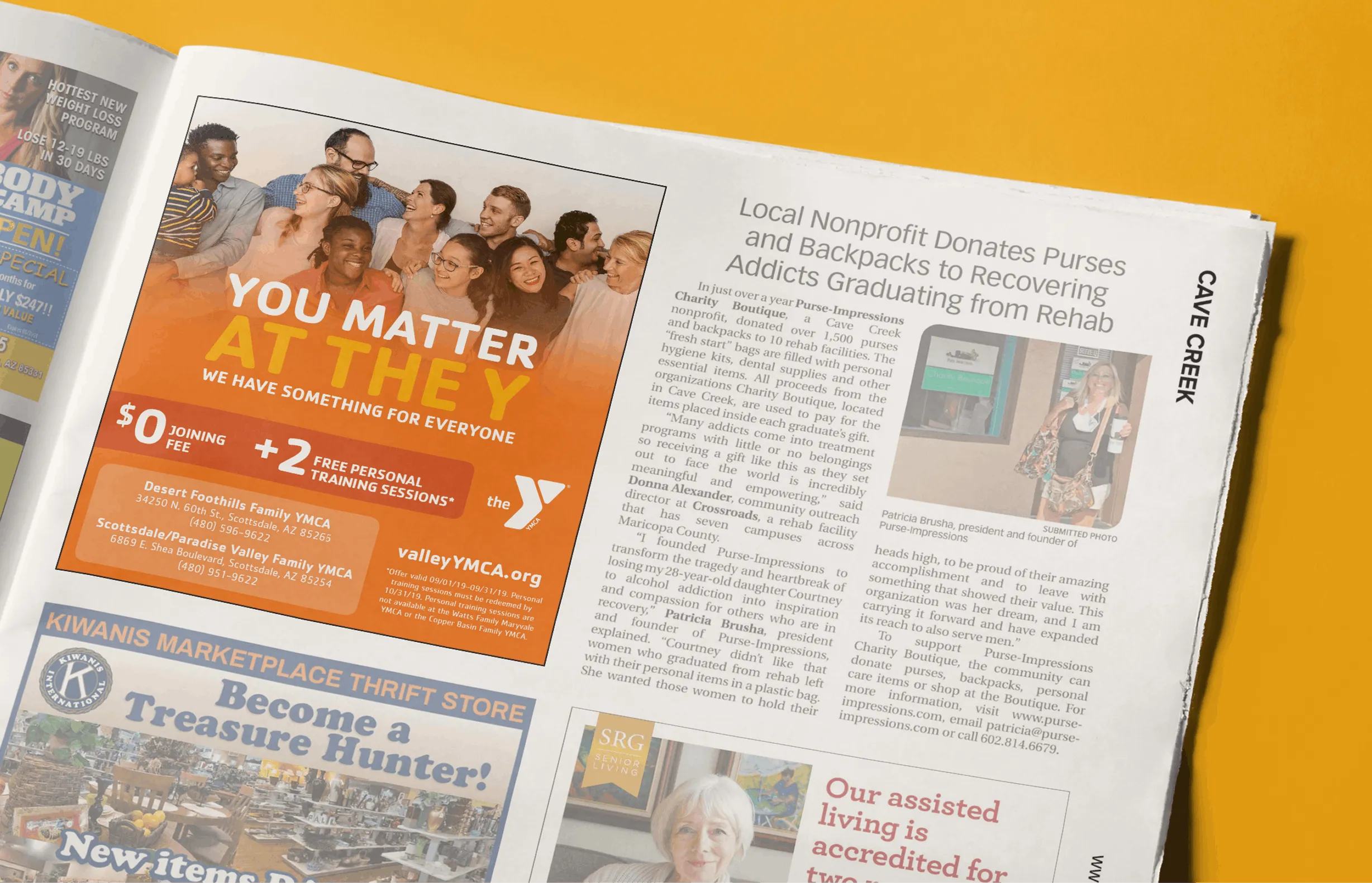 A YMCA "You matter at the Y" advertisement shown in an open magazine.