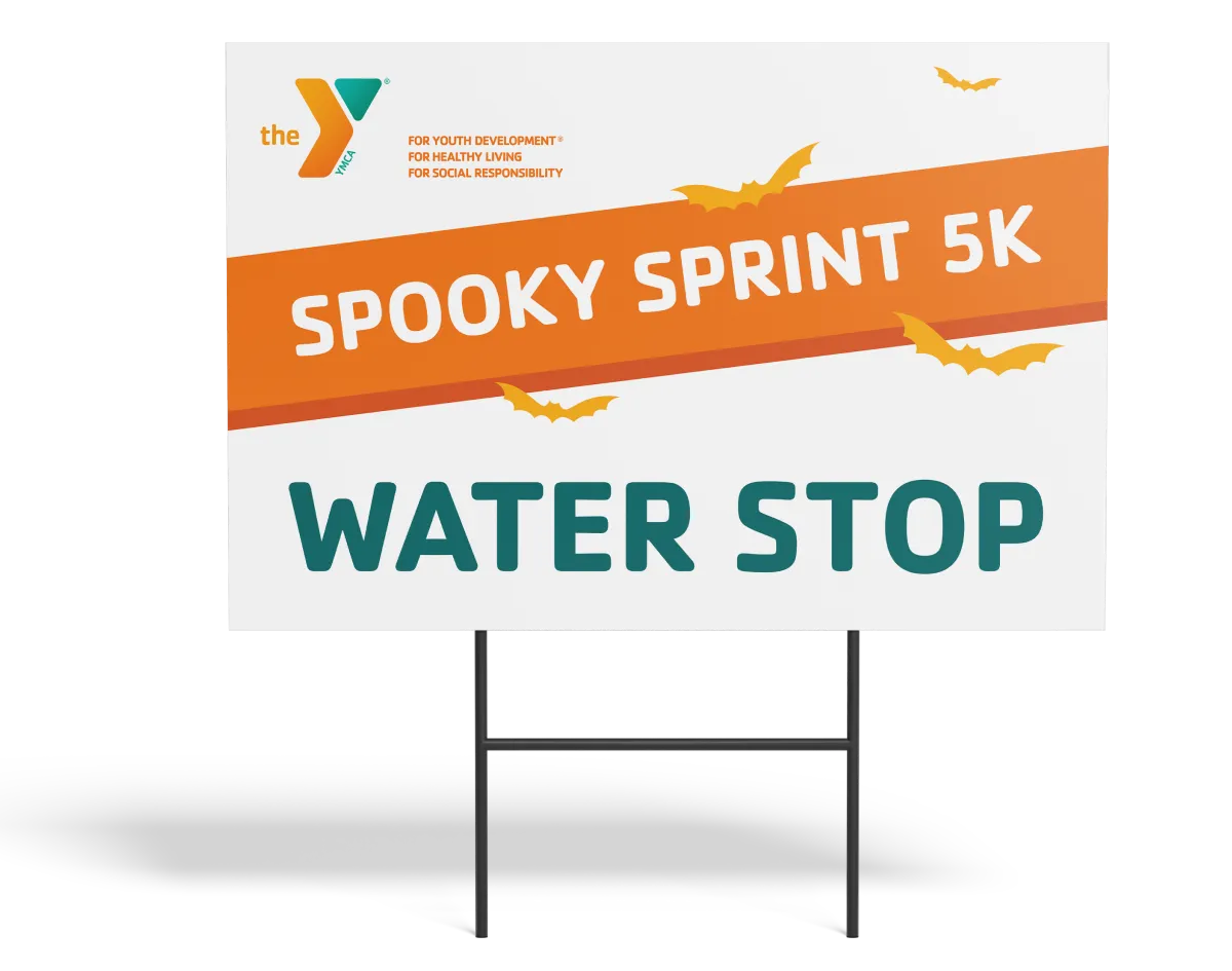 A YMCA "Spooky Sprint 5K" water stop lawn sign.