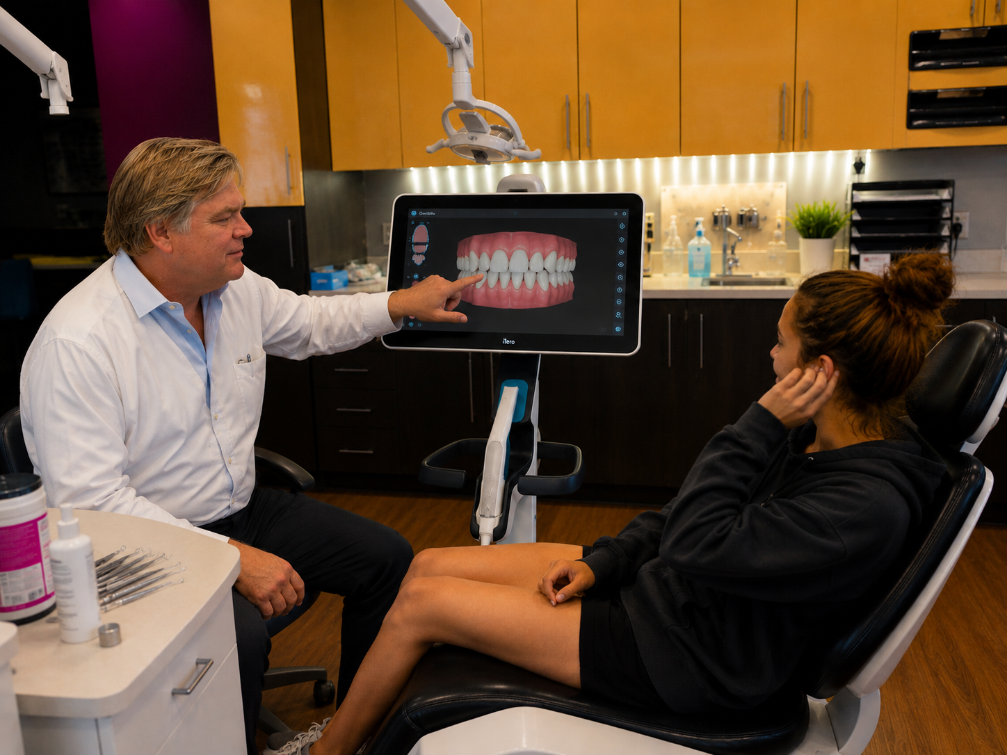 Dr. James Kendrick reviewing a digital orthodontic scan with a patient