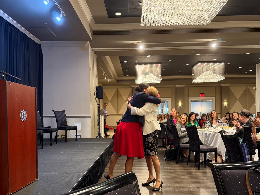 Rockville Mayor Monique Ashton and GRCC President & CEO Marji Graf embracing at the Women's Leadership Conference