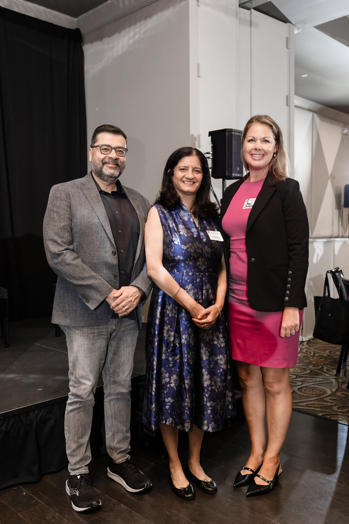 Anupam Malhotra and Dr. Mudita Malhotra with Cheryl Costello, CEO of CosTELLo Your Story, at the Women's Leadership Conference