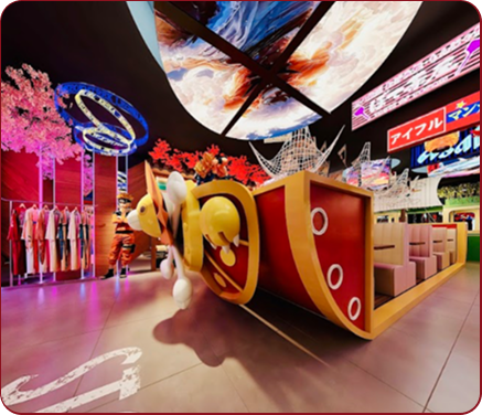 Colorful indoor scene with a large decorative ship, hanging signs, and pink trees under a vivid ceiling display.