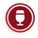 White microphone icon inside a dark red circle with a red outer ring on transparent background.