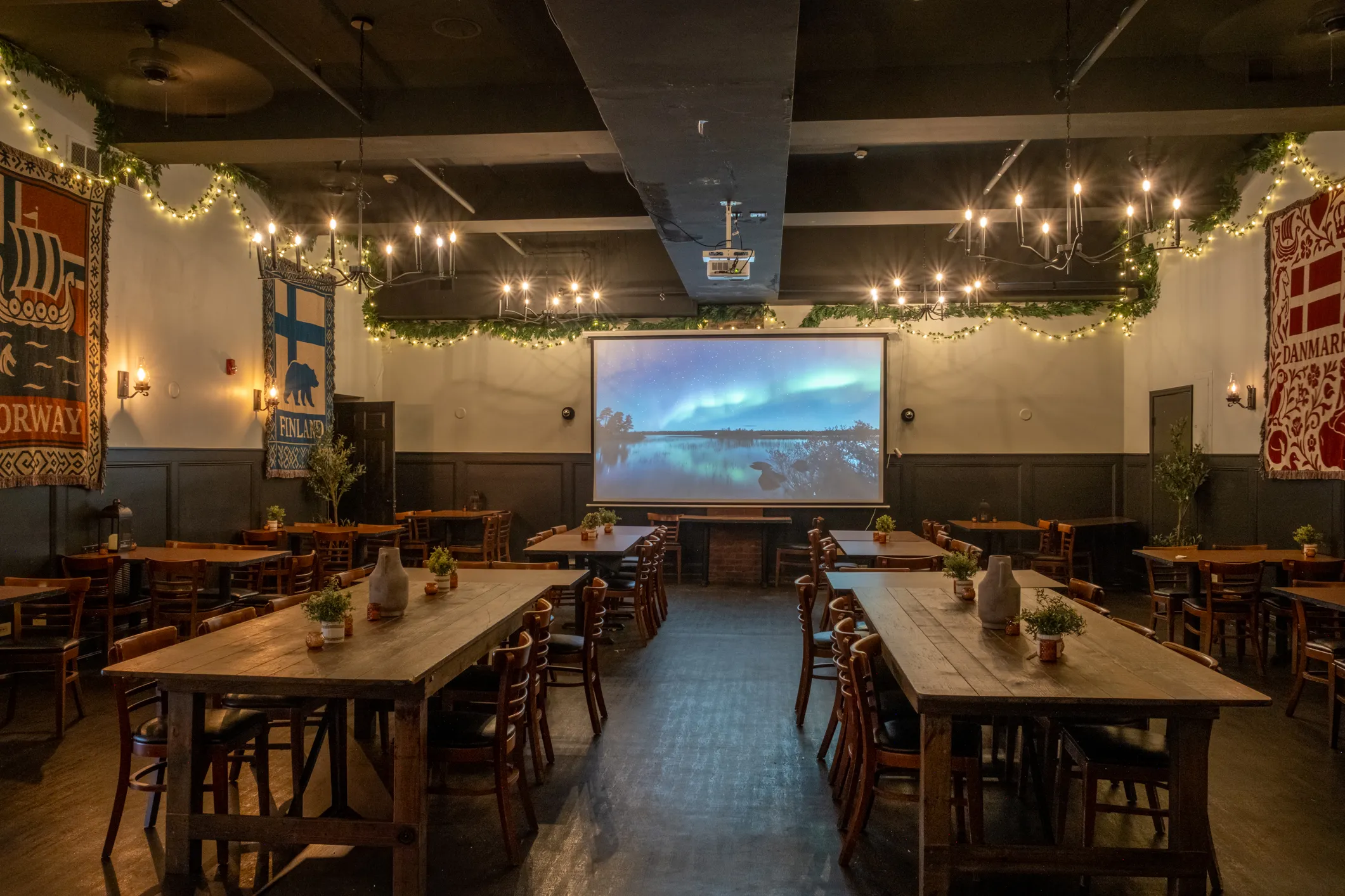 The Viking Hall at Kingston Nord set with long farm tables for a large group