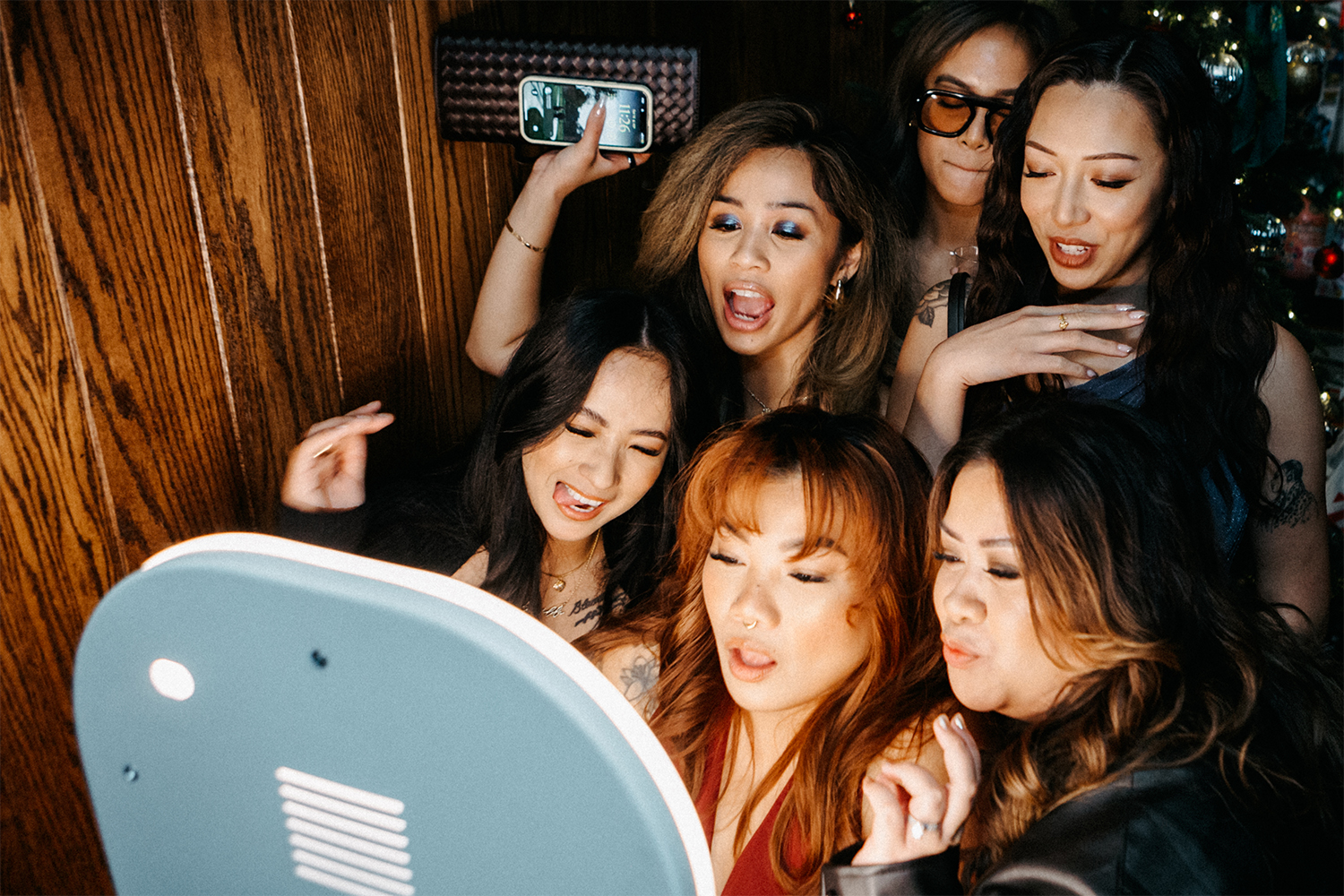 group of friends using soundtrack's photobooth.