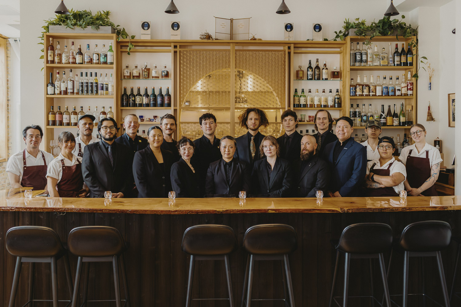 The Bar Kumiko team gathered behind the bar