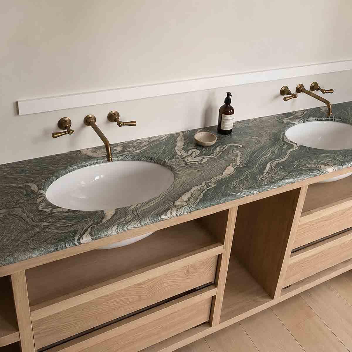 Handcrafted natural stone bathroom designed, fabricated and installed by Coulon Stone