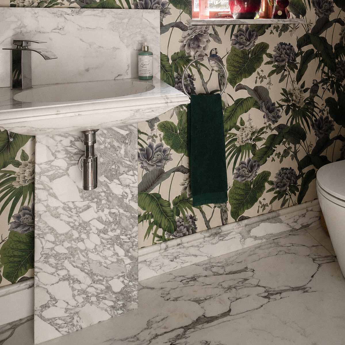 Handcrafted natural stone bathroom designed, fabricated and installed by Coulon Stone
