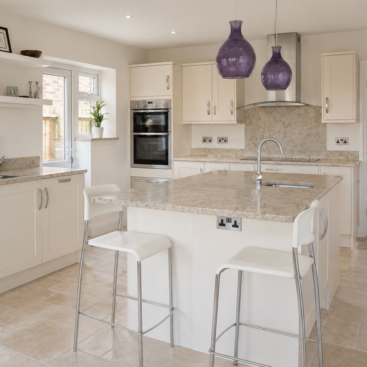 Handcrafted natural stone kitchen worktop designed and installed by Coulon Stone