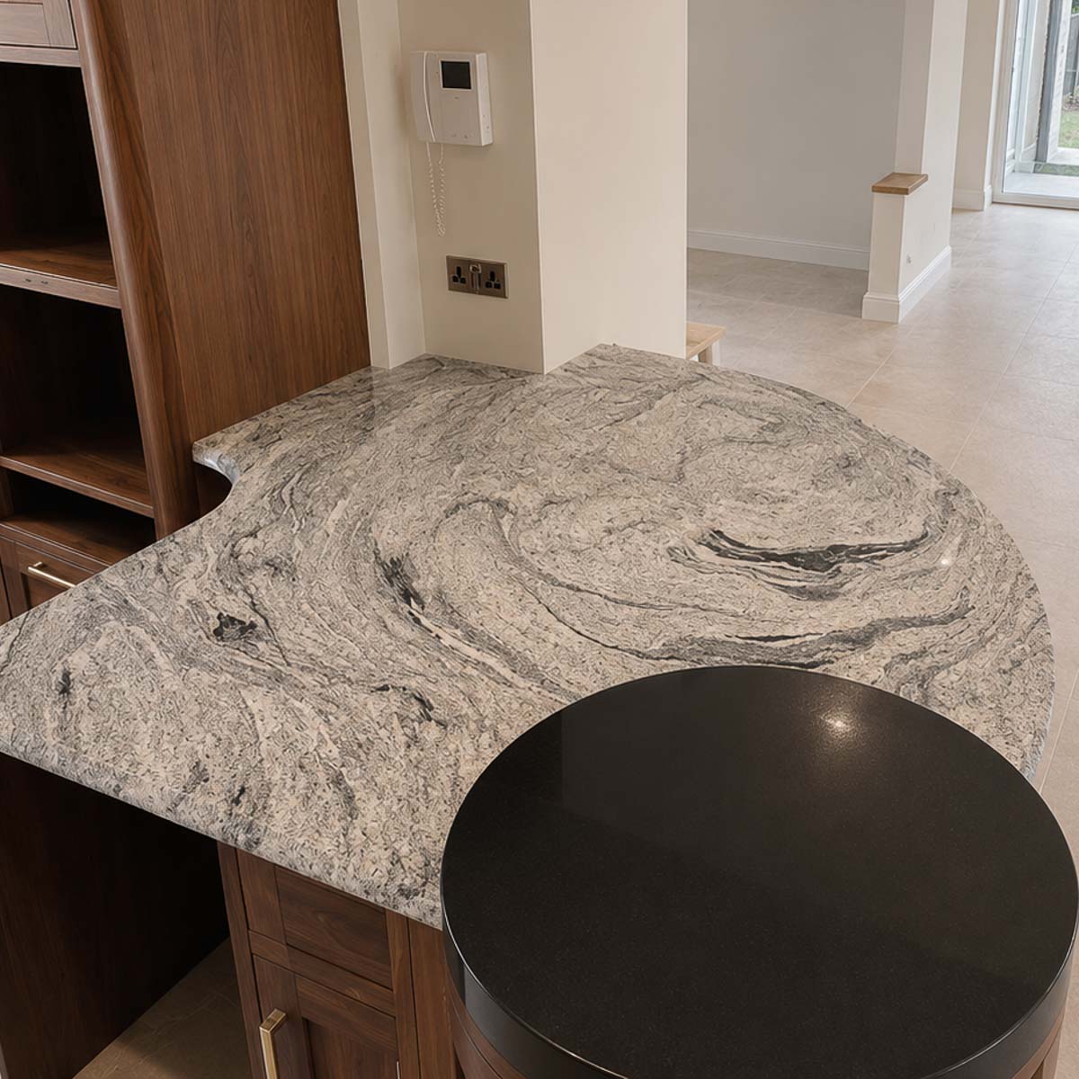 Handcrafted natural stone kitchen worktop designed and installed by Coulon Stone