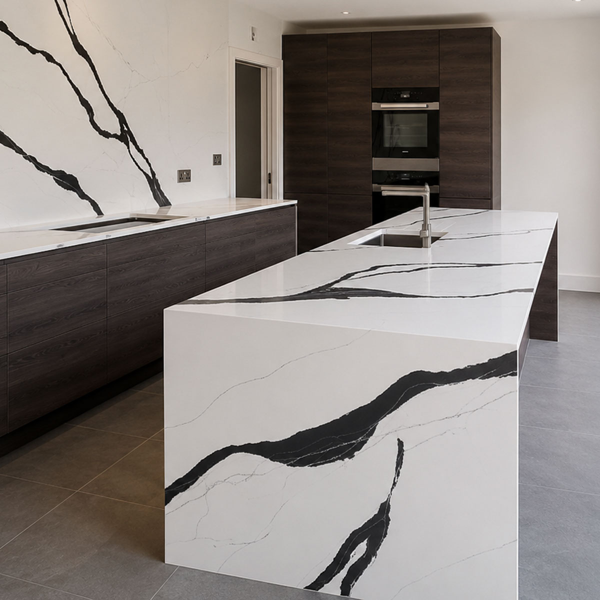 Handcrafted natural stone kitchen worktop designed and installed by Coulon Stone