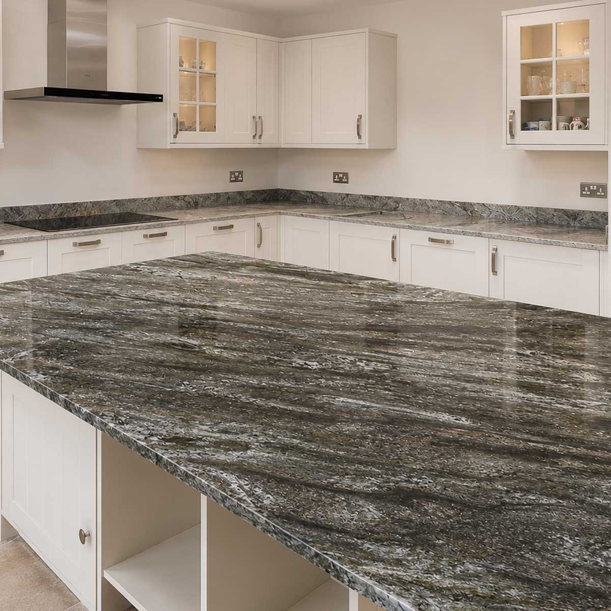 Handcrafted natural stone kitchen worktop designed and installed by Coulon Stone