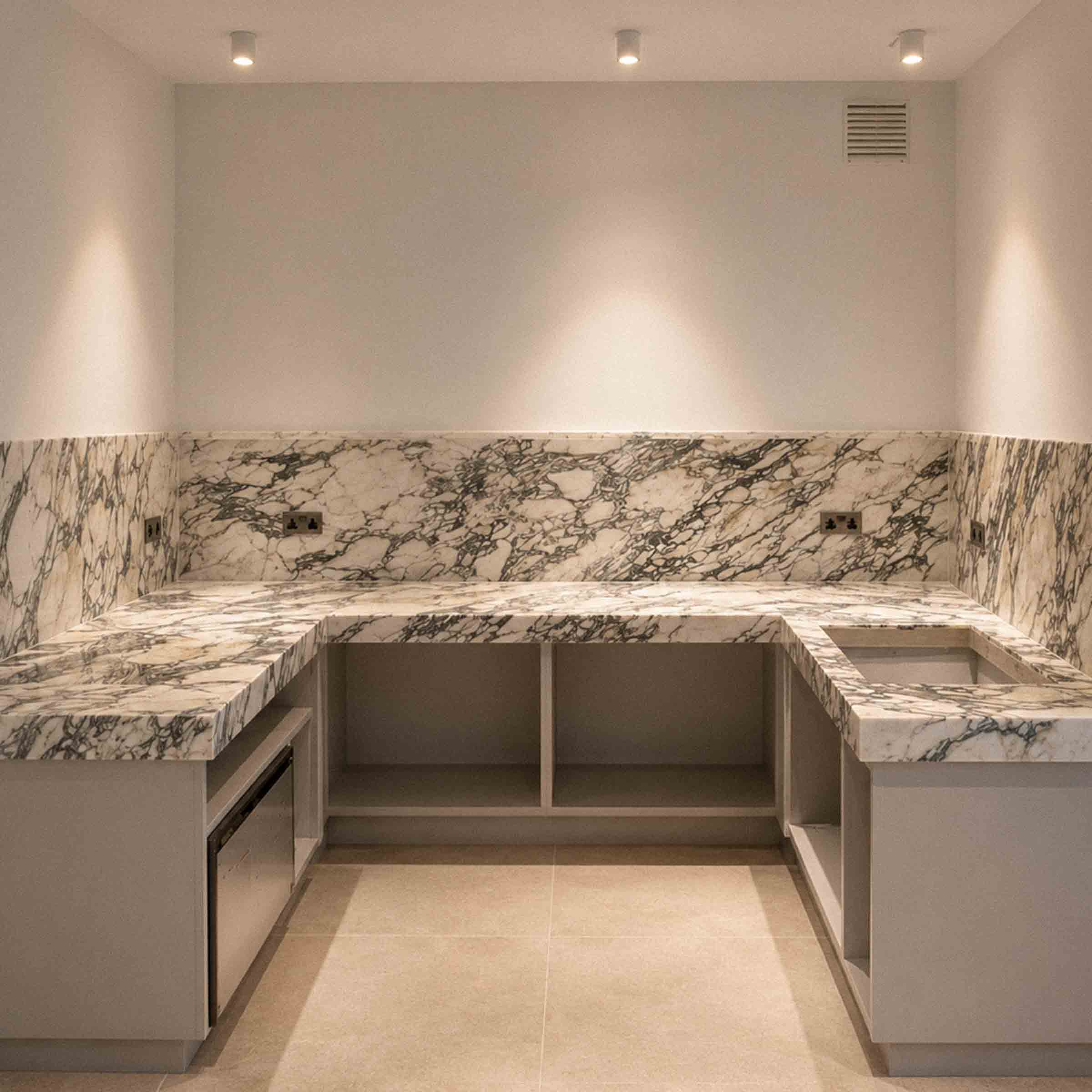 Handcrafted natural stone kitchen worktop designed and installed by Coulon Stone