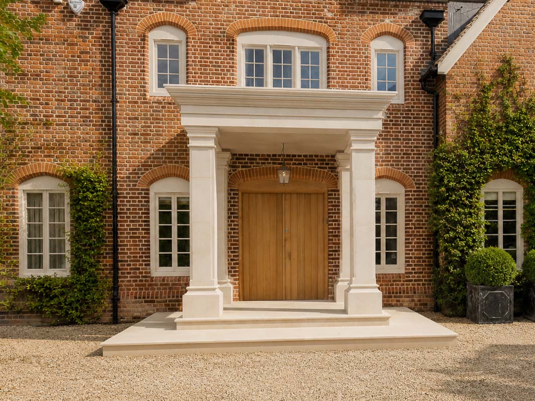 Semi rijo limestone Bespoke stone portico with classical columns at a luxury residential property