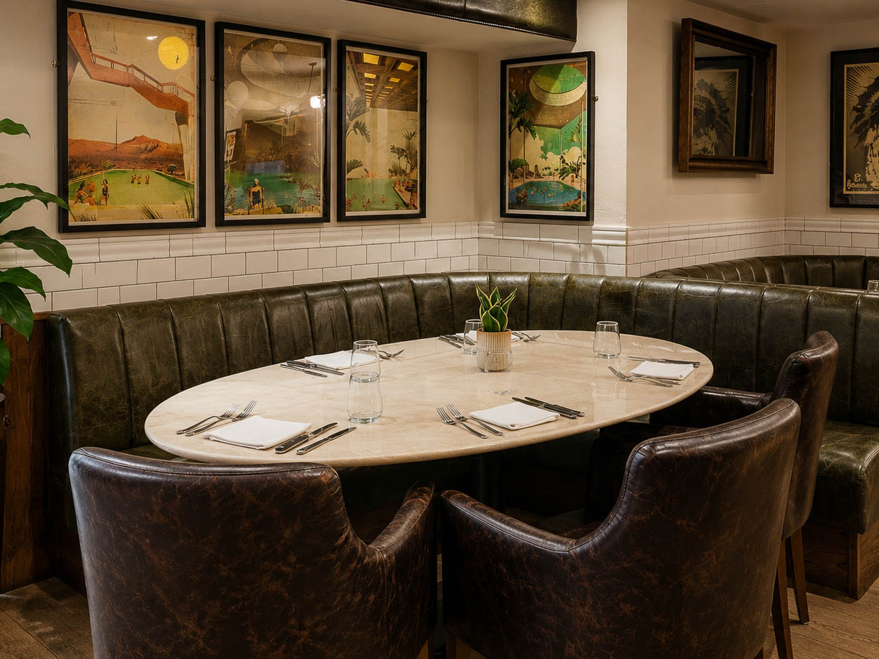 Bespoke stone dining table installed in a restaurant seating area