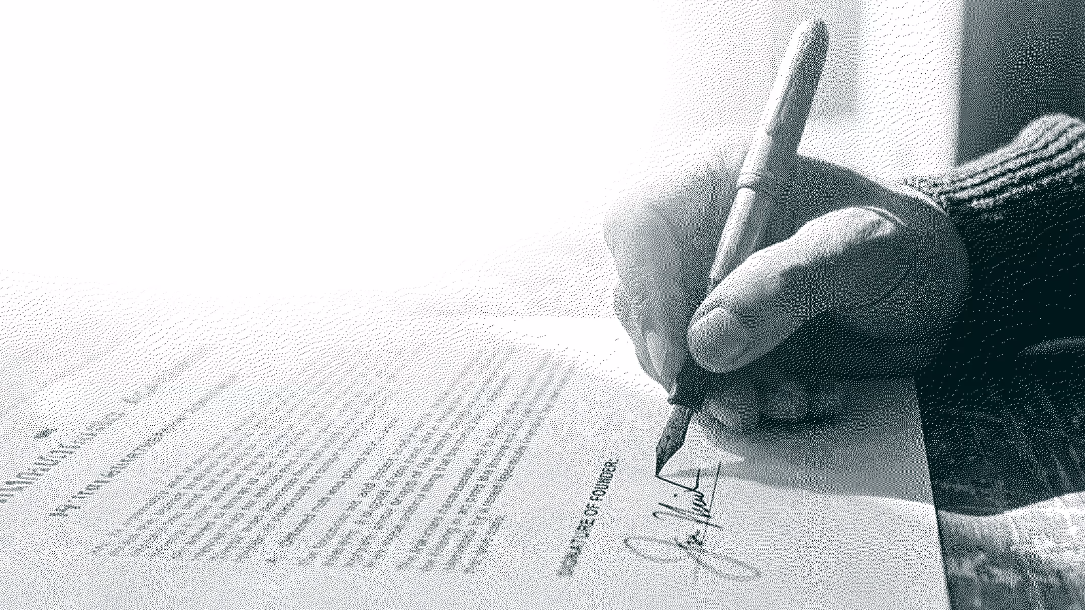 Person signing a document with a fountain pen, focused on the signature area.