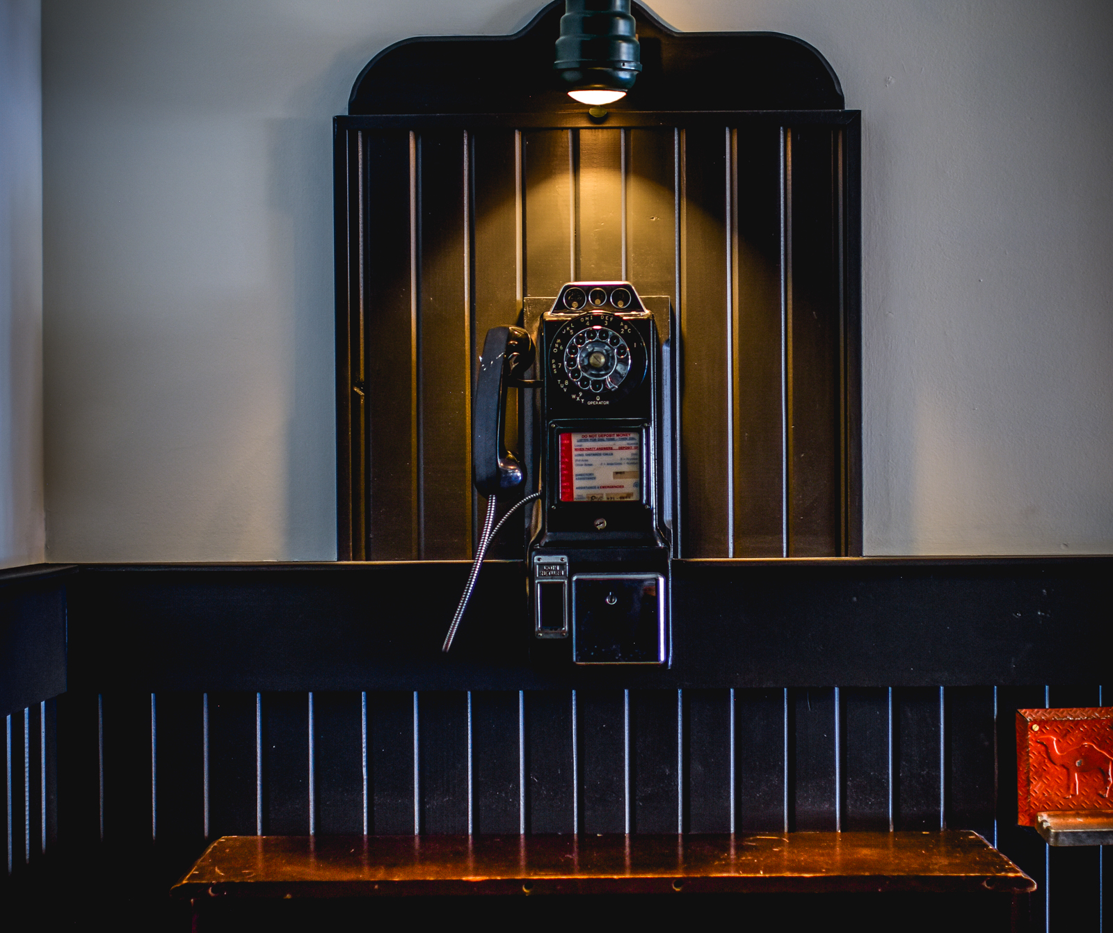 A black and white photo of a telephone.