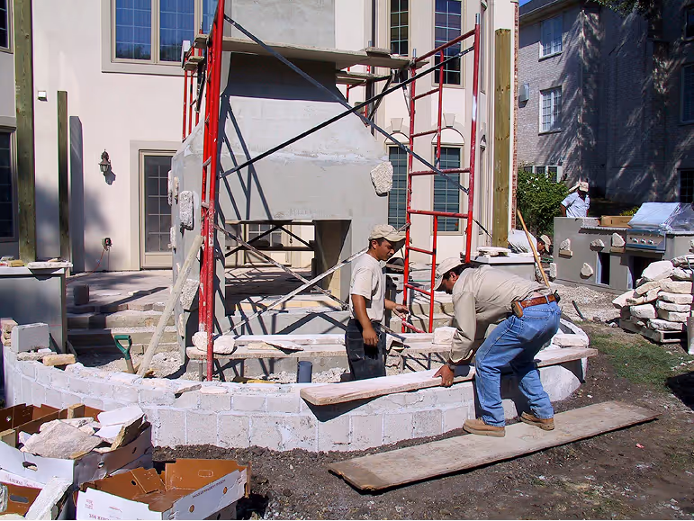 Men constructing patio