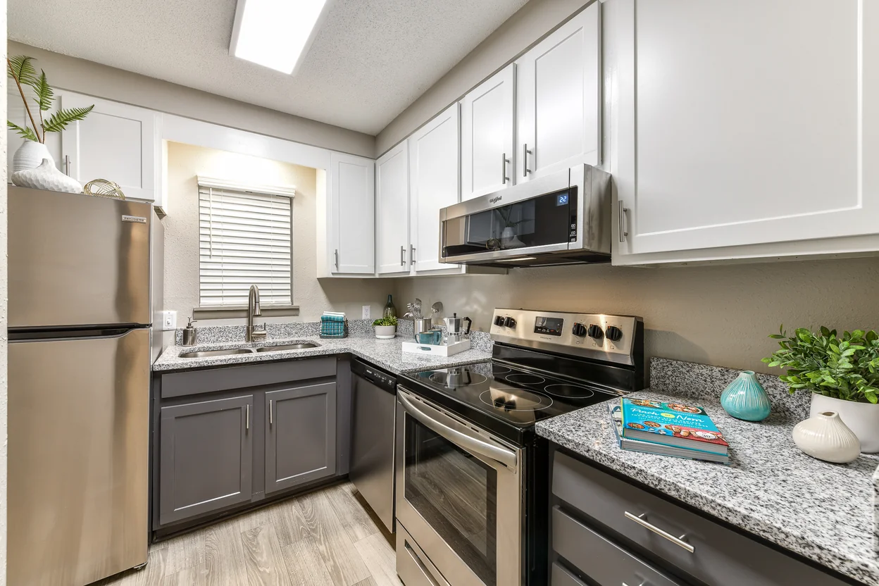 Berry Falls kitchen with white cabinets and granite countertops