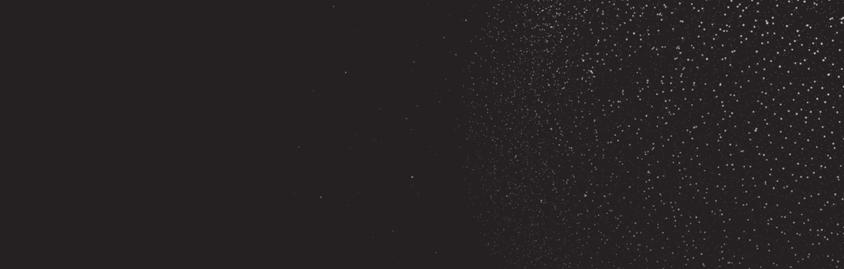 Dark background with a scattered pattern of small white dots mostly on the right side.