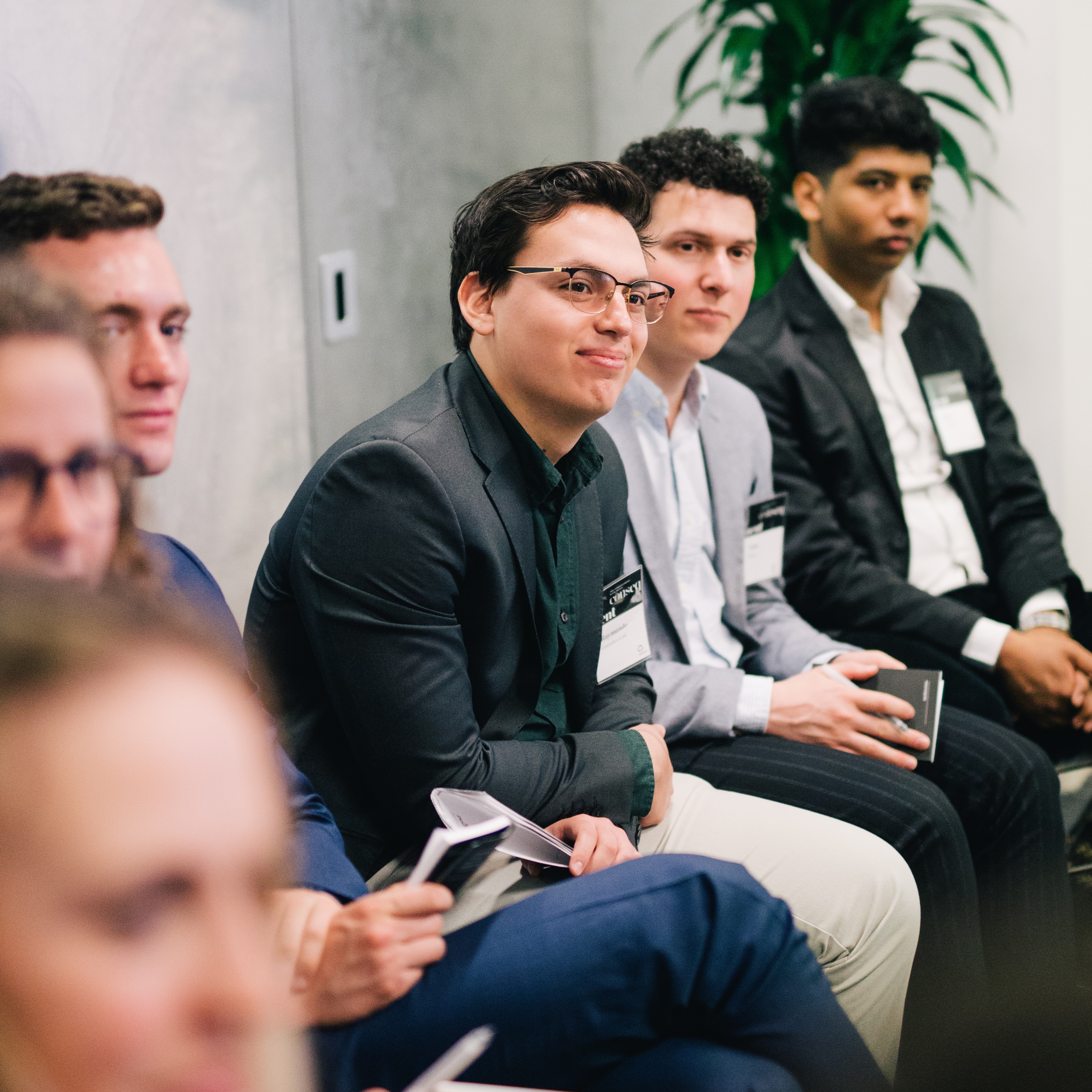 Participants seated together during a Minerva event.