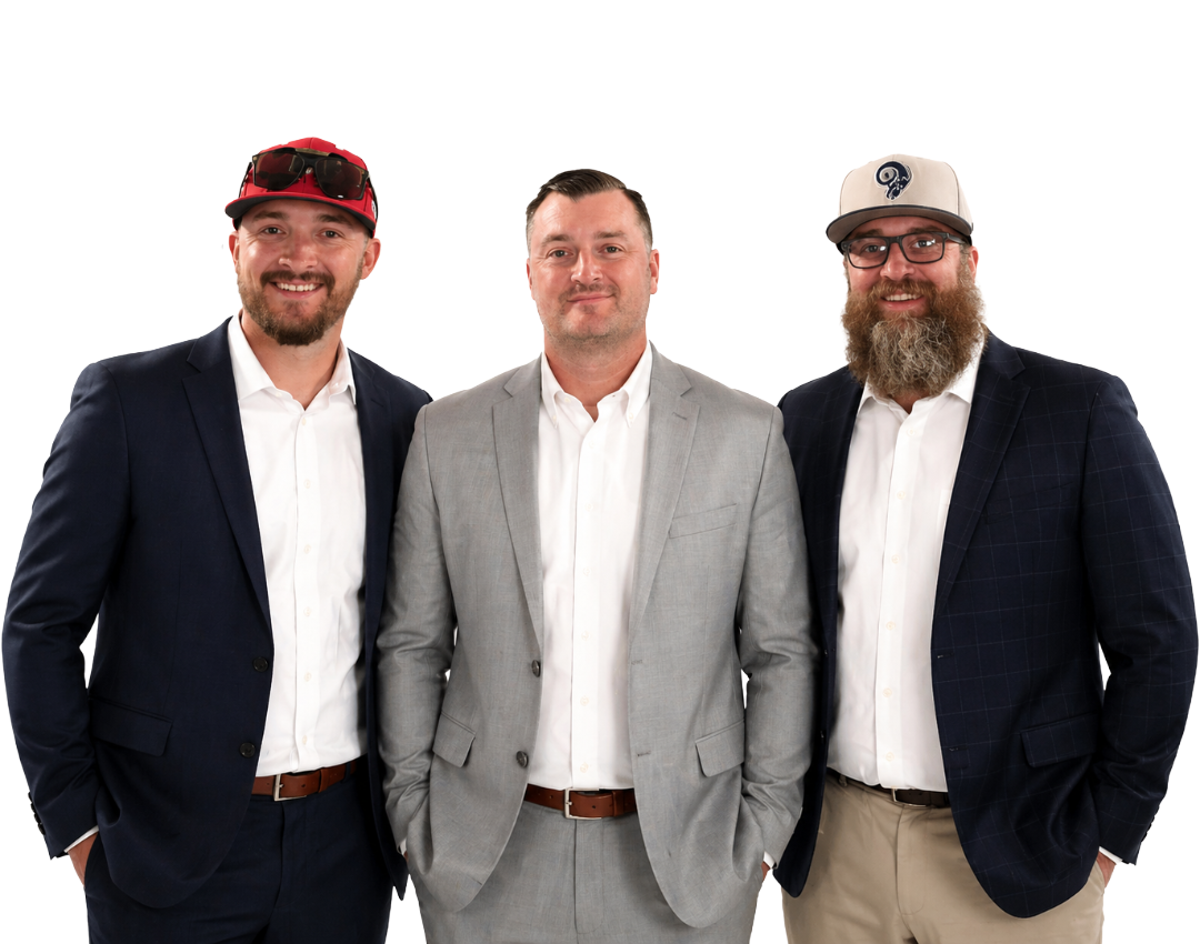 Three men in business casual attire, two wearing caps, all with jackets and white shirts, smiling. These men are 3 brothers: Joseph, Richard, and Robert. 3 Fire protection Professionals.