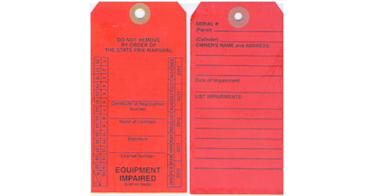 Two red tags used for tagging fire extinguishers.  