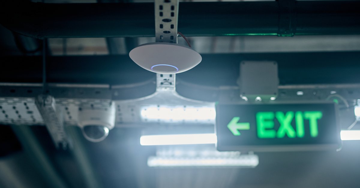 A neon green exit sign. 
