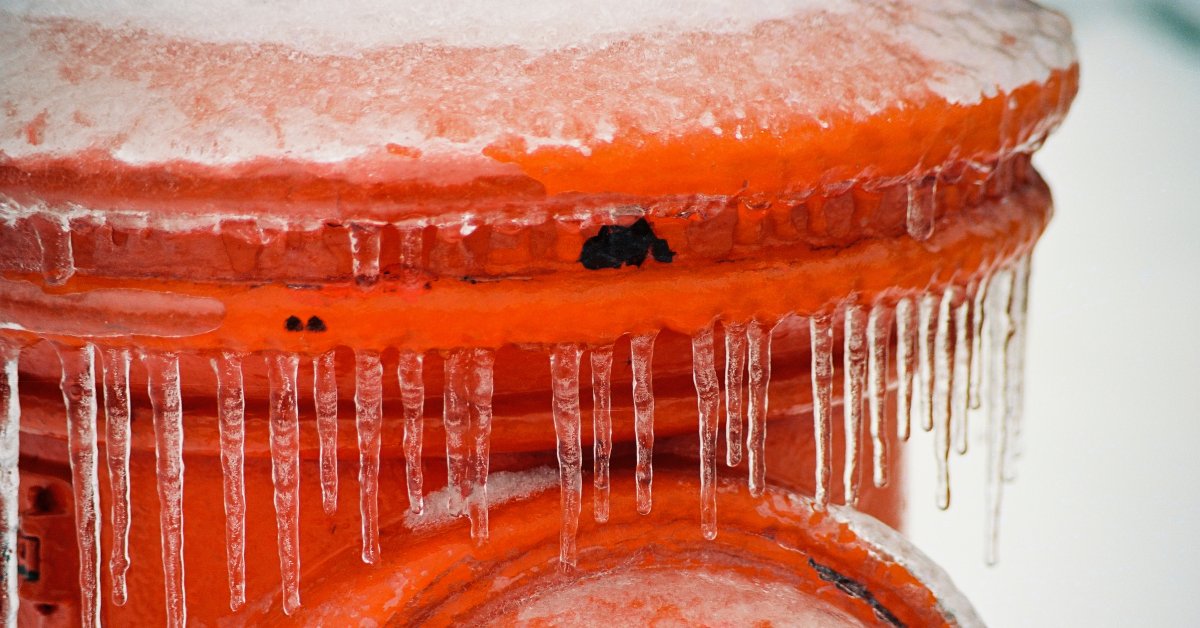A fire hydrant frozen over. 