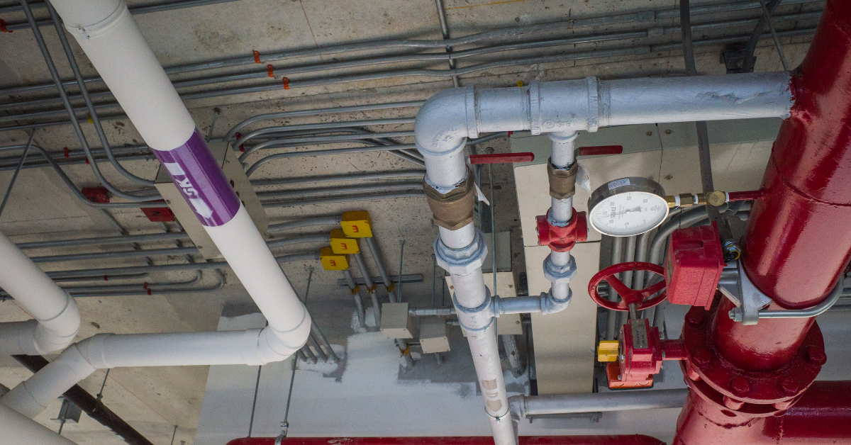 Commercial building renovation that triggered a mandatory fire alarm and sprinkler system upgrade