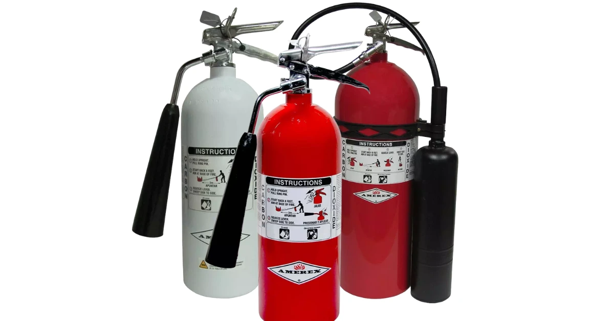 Fire extinguisher mounted on a wall in a business, meeting fire code compliance requirements