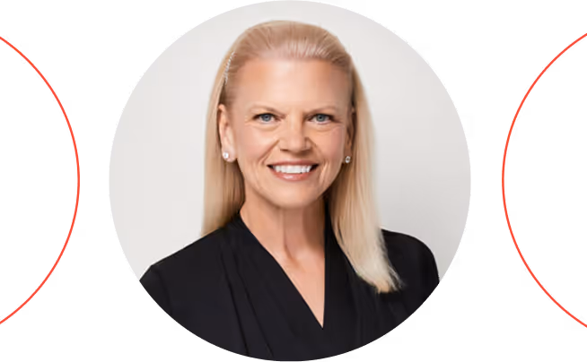 Smiling woman with straight blonde hair wearing a black blazer against a white background.
