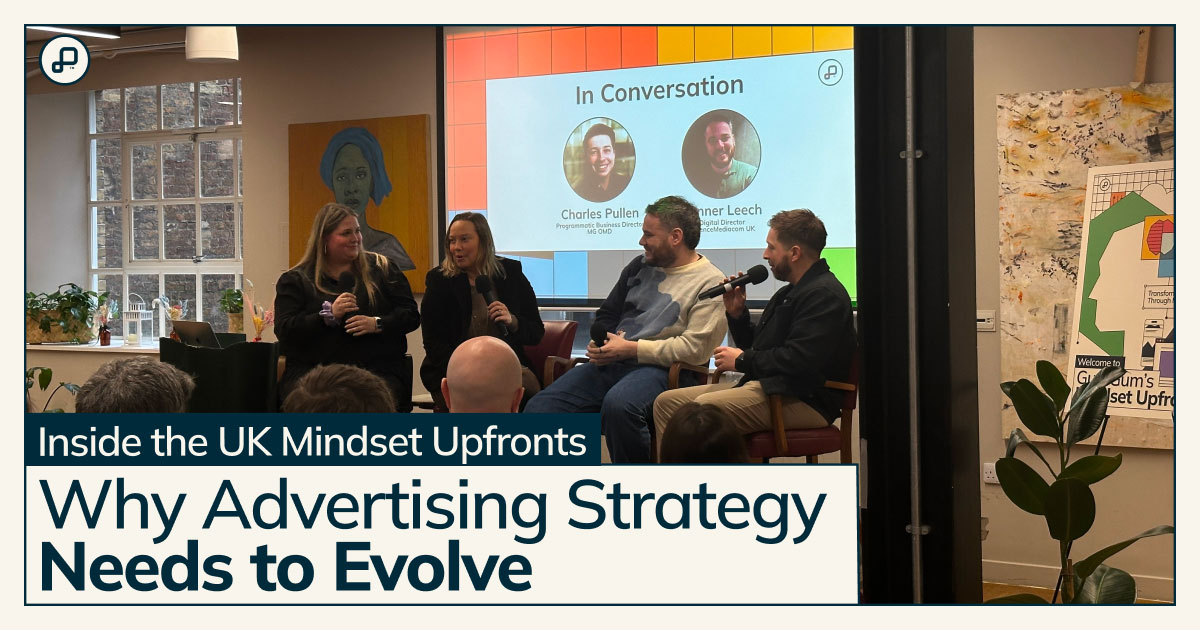 speakers at the event on stage in front of a slide show with a text overlay of the blog title