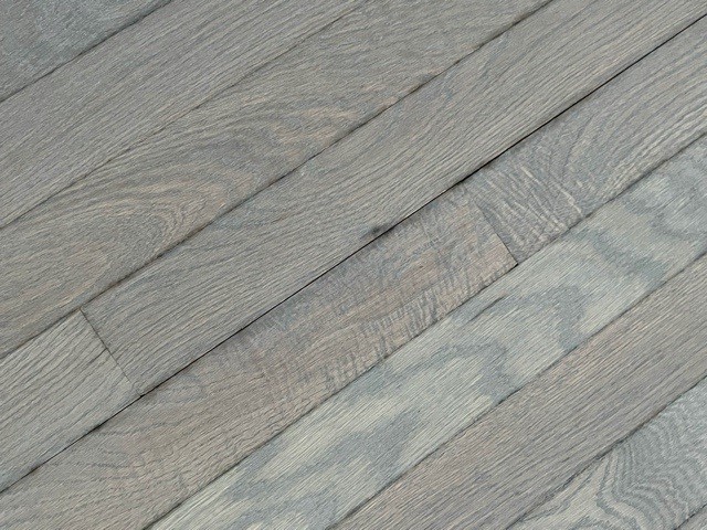 Gray wood look boards laid on a diagonal by Brazil Floors