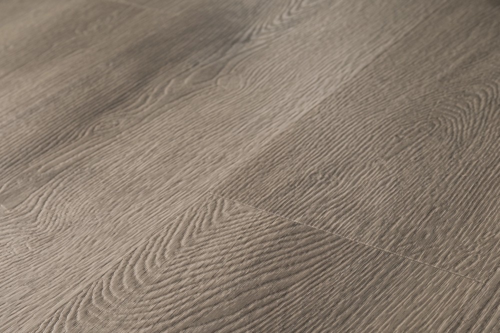 Elliptical Oak COREtec Pro 7 inch LVP boards from a low angle by Brazil Floors