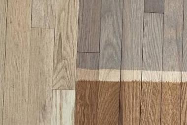Gray and brown stain sample patches on a sanded oak floor, Brazil Floors