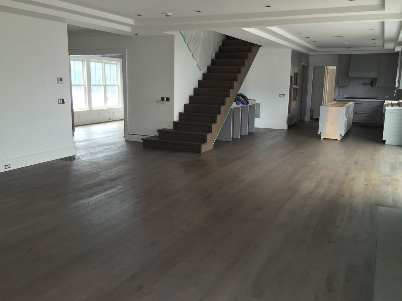 Kitchen hardwood floor with a clear glossy water based finish, Brazil Floors