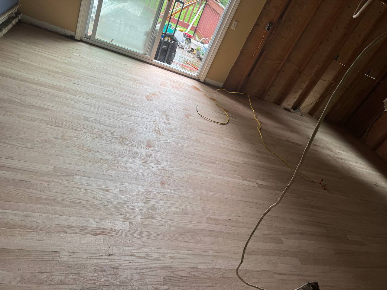 Oak floor sanded down to bare wood and ready for stain in Westerly, RI