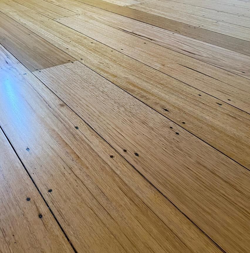 Raw oak boards freshly installed in a Glocester room, Brazil Floors