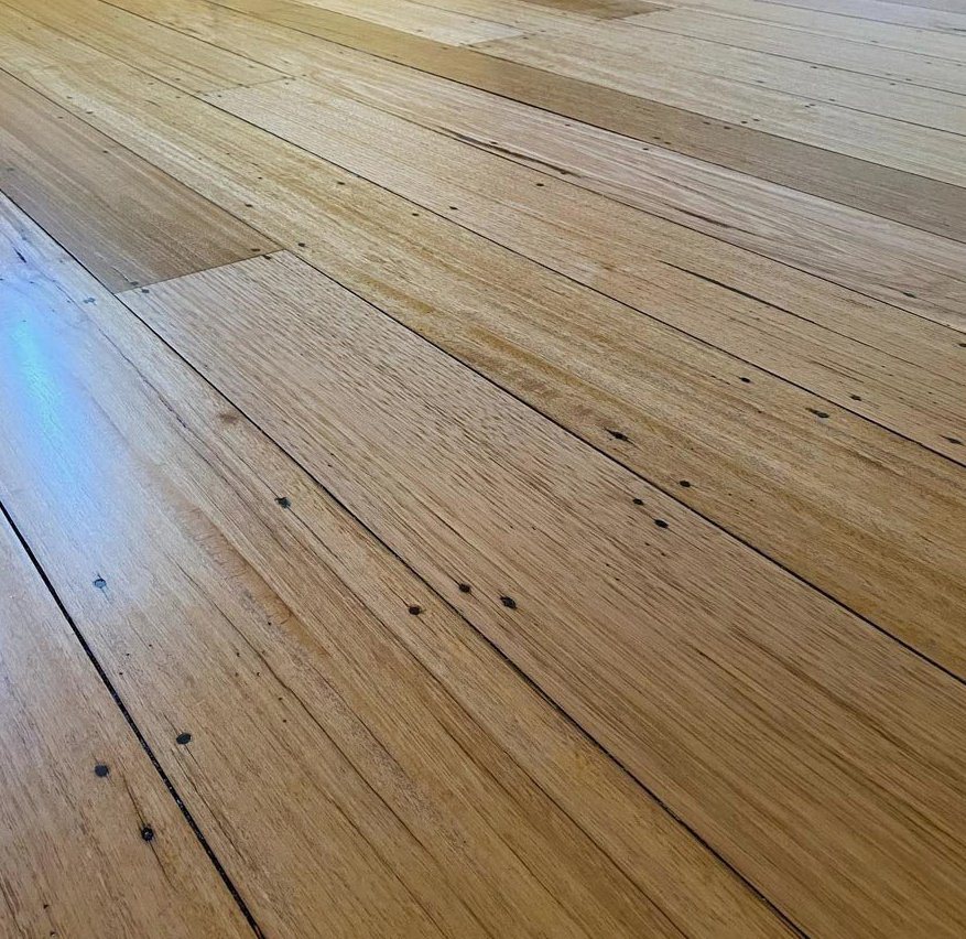 Raw oak boards freshly installed in a West Warwick room, Brazil Floors