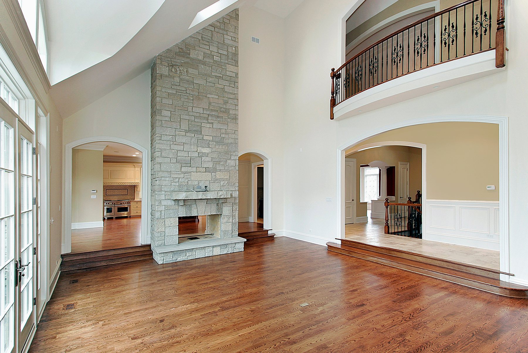 Restored hardwood by a stone fireplace in a house near Washington Village, Brazil Floors