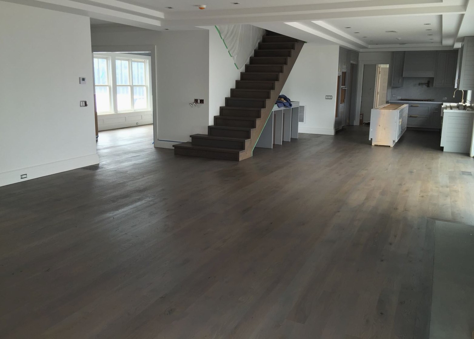 Refinished dark oak in an open layout near Thornton, Brazil Floors