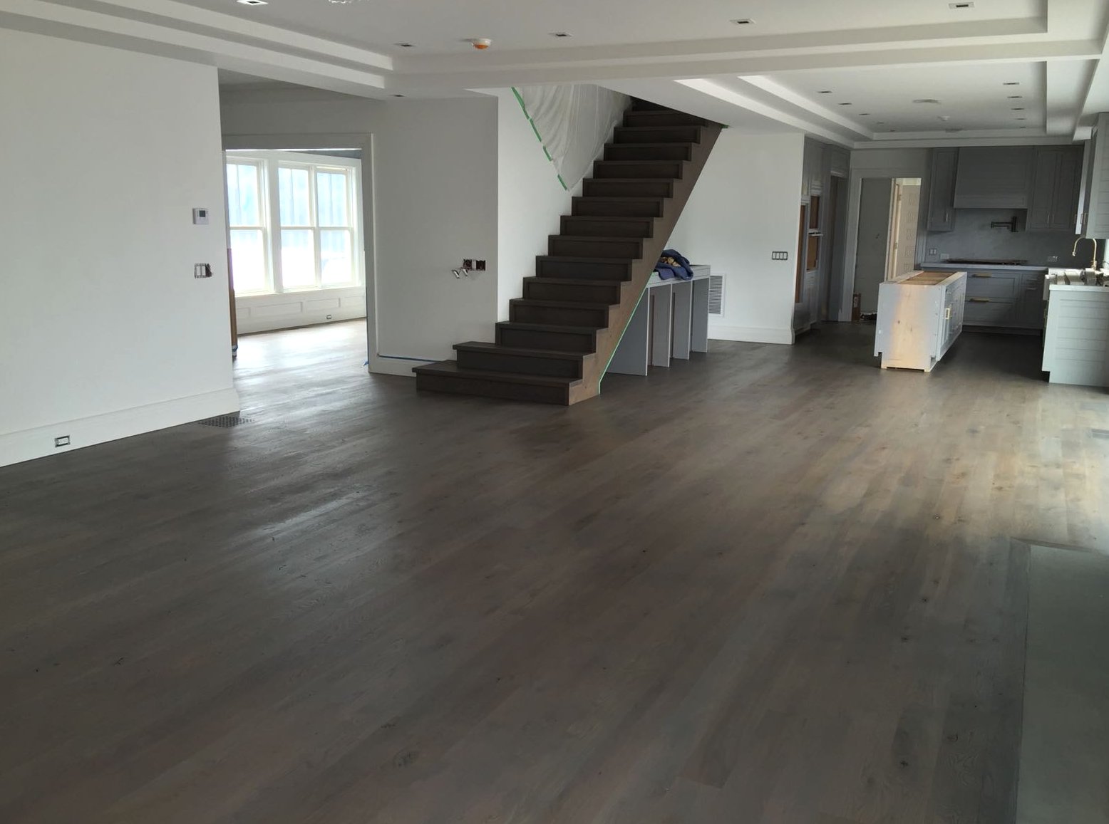 Espresso toned restained hardwood across the whole level near Elmhurst, Brazil Floors