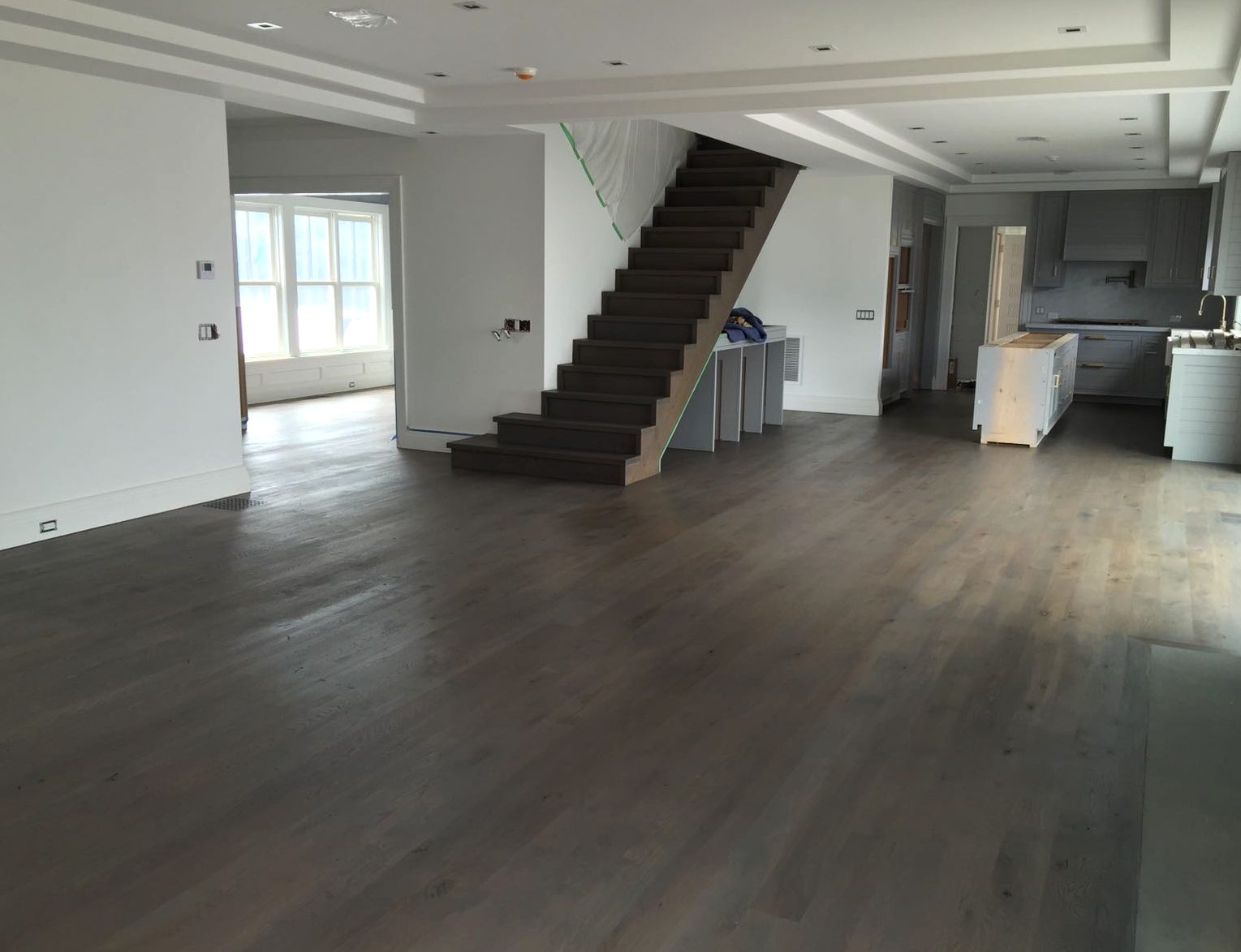 Sanded and restained hardwood through the first floor in a Scituate house, Brazil Floors