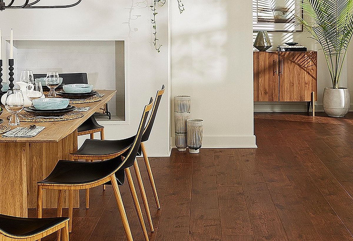 Rich brown laminate flooring in a Bay Spring dining room, Brazil Floors