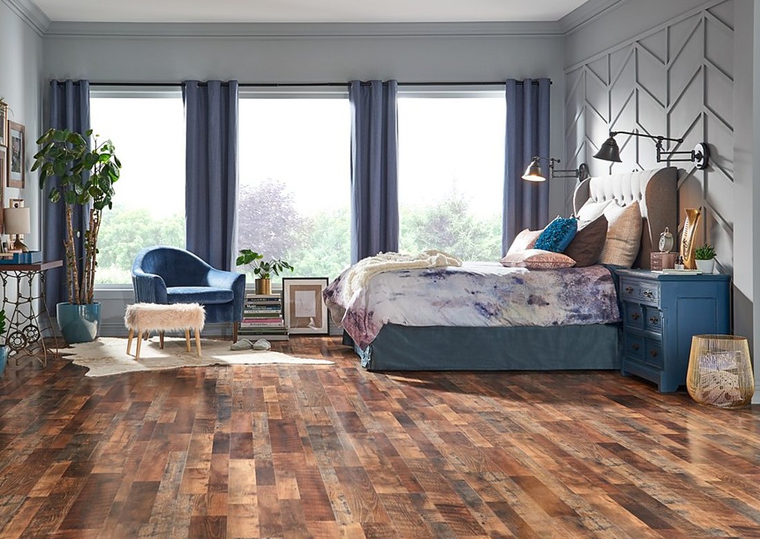 Dark rustic laminate in a bedroom with big windows near Second Beach, Brazil Floors