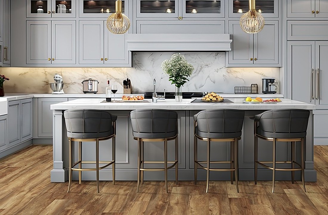 Light laminate in a warm white kitchen with island stools by Carr Pond, Brazil Floors