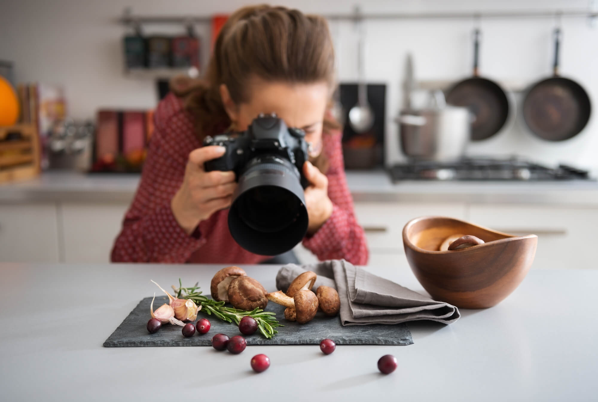 a photographer taking pictures of food
