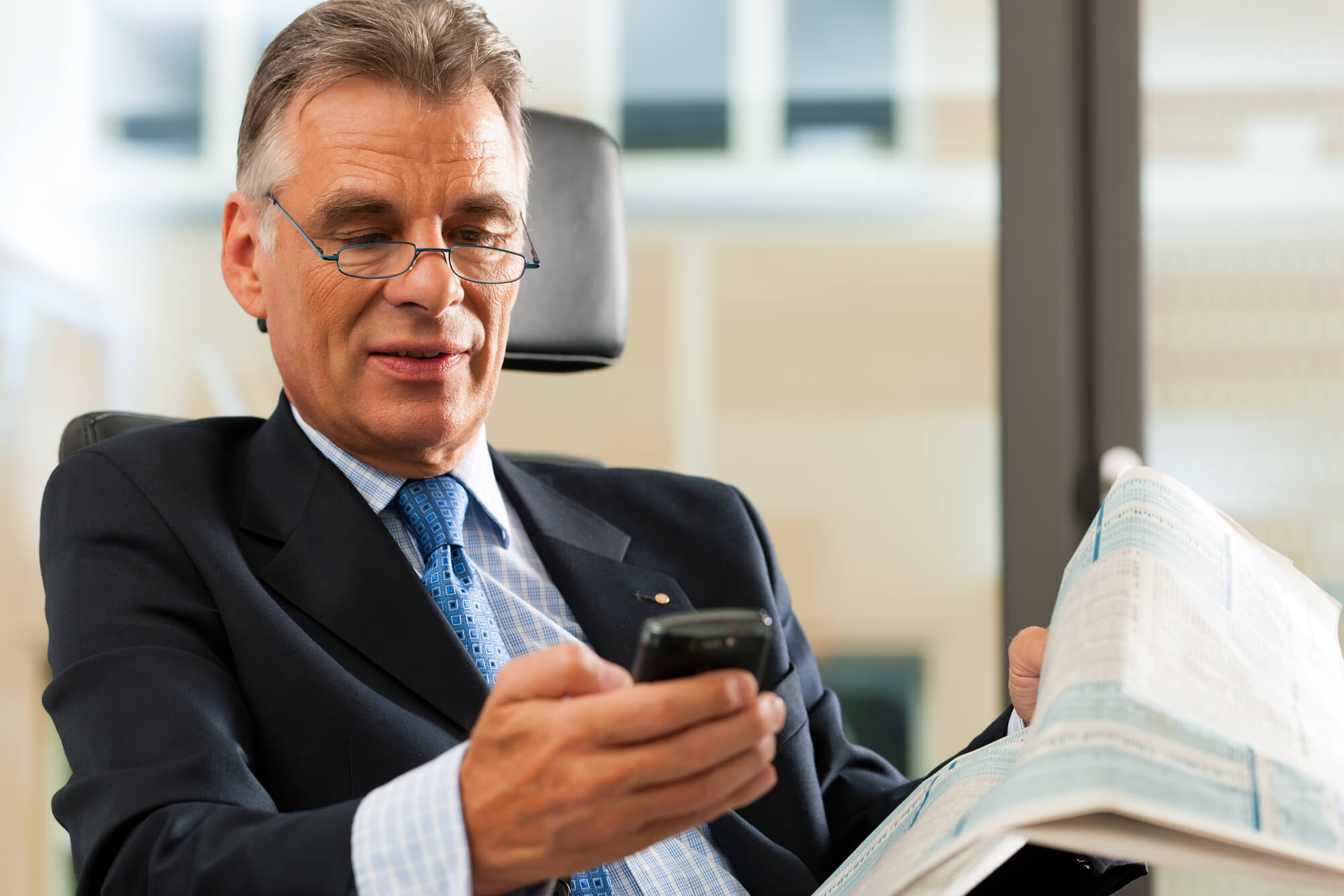 A businessman checking his inbox